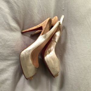 Christian Louboutin gold slingbacks with cork heel